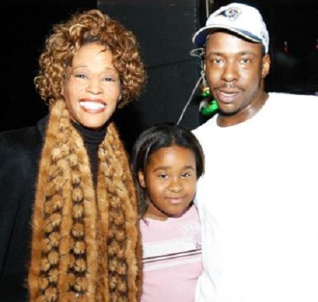 Bobby Brown with his ex wife and daughter, Bobbi Kristina.