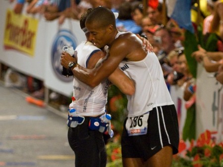 David Goggins hugging a marathon runner