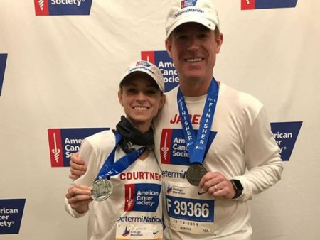 Courtney and her husband runs marathon for cancer cause