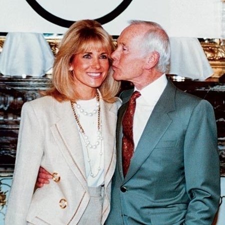 Late Johnny Carson with his wife Alexis Maas at an event