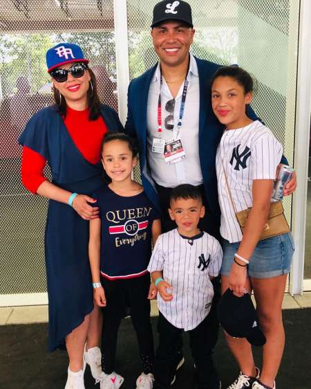Jessica Beltran with her husband and children
