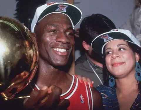 Juanita Vanoy and her ex-husband Michael Jordan With NBA Trophy
