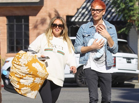 Luca Cruz Comrie's mother Hillary Duff with her boyfriend Matthew Koma and a newly born baby