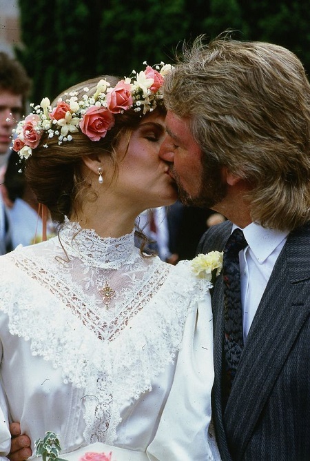 Helen Soby and Noel Edmonds on their wedding day kissing after exchanging wedding vows