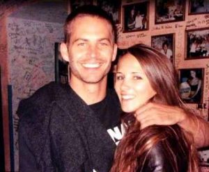 Meadow Rain Walker's parents Rebecca Soteros & Paul Walker hugging each other. The picture is while the pair were together