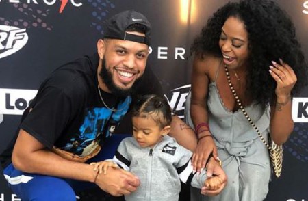 Sarunas Jackson and Dominique Perry with their daughter, Zen
