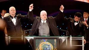 Dusty Rhodes with his son in wwe hall of fame inductance
