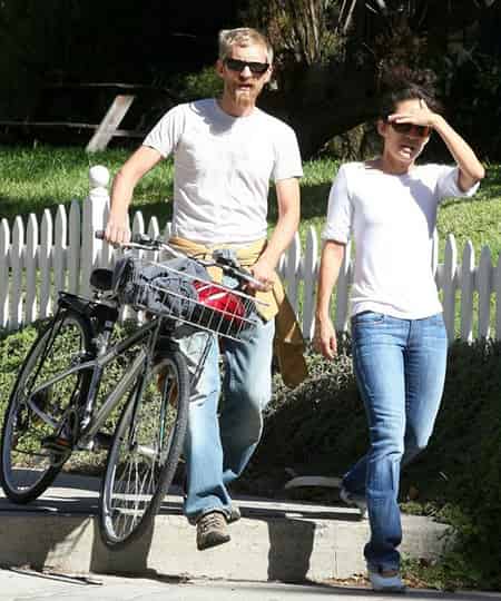 Andrew Featherston and his girlfriend Sandra Oh going on Cycling together