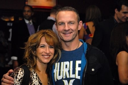 Suzy Kolber with her husband Eric Brady at an event