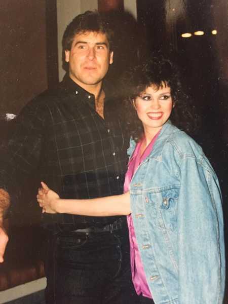 Marie Osmond hugging her second spouse, Brian Blosil