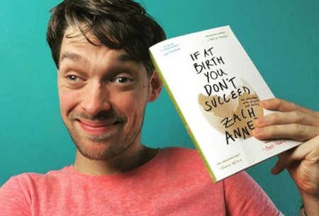 Zach Anner with his book.