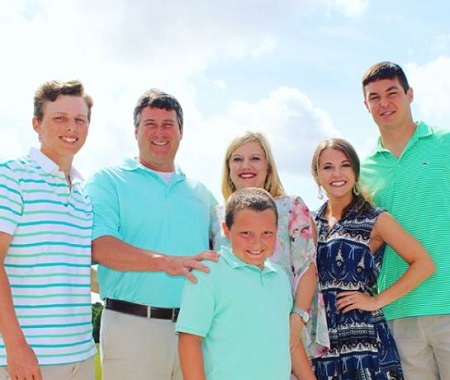  Haleigh Hughes (second from right) with her husband Nick Mullens (right), father Kiley, mother Kellie Hughes, and brothers Layton (left), Kale Sean Hughes.