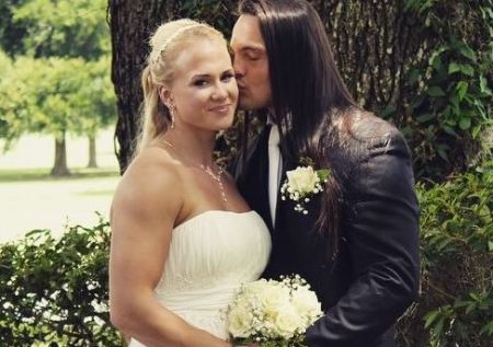 Sarah Backman and ex-husband, Taylor Rotunda on their wedding day in June 2014.