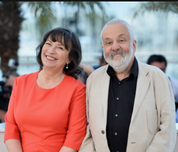 Mario Bailey And Her Husband Mike Leigh. They are apperaing together for the primer of The Crown.