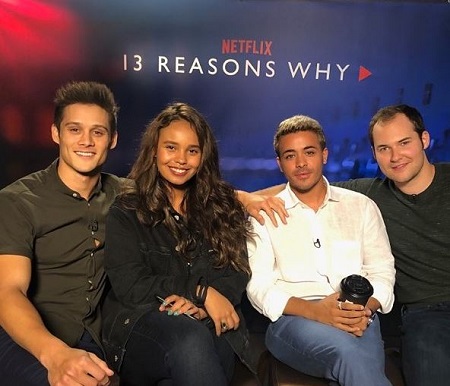 The actor Christian Navarro (white shirt) with the 13 Reasons Why cast Alisha Boe (actress), Timothy Granaderos (actor left), and Jay Asher (novelist right).