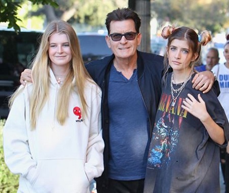 Denise Richards former husband Charlie Sheen (actor) and daughters Sam (right) and Lola Rose Sheen (left).