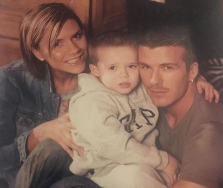 The childhood image of Brooklyn Beckham with his celebrity parents David Beckham and Victoria Adams Beckham.