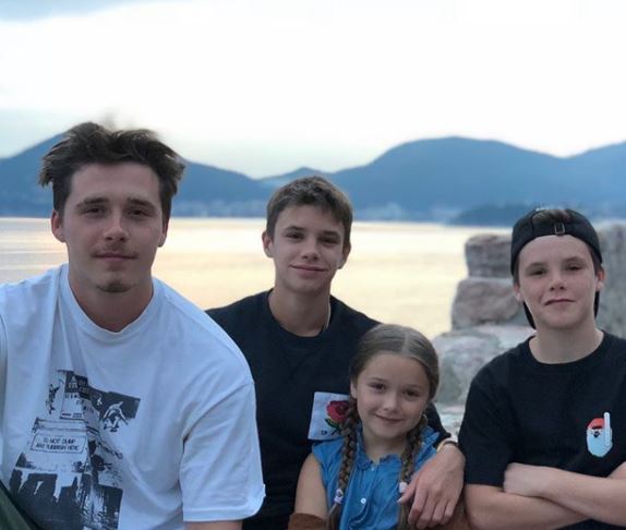  Brooklyn Beckham (white T-shirt) with his elder siblings, Romeo James, Cruz David (brother), and Harper Seven (sister).