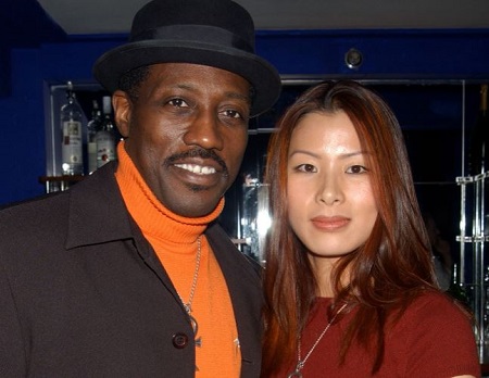 The American actor Wesley Snipes is married to a South Korean painter Nakyung "Niki" Park since March 17, 2003.