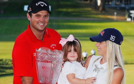 Patrick Reed poses with his wife Justine and their daughter Windsor-Wells after winning The Barclays in 2016.