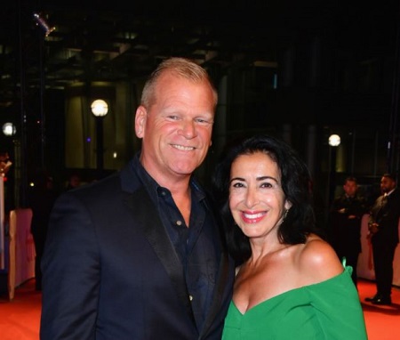 Mike Holmes is dating his girlfriend, Anna Zappia since 2000.