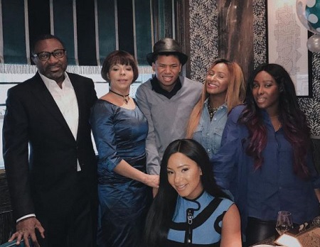 The entrepreneur Femi Otedola with his wife Nana Otedola (second from left), and four adorable kids, Tolani (right), DJ Cuppy (second from right), Temi (sitting), and Fewa Otedola.