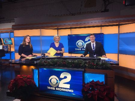 Rebecca Kopelman with her fellow weather newscast of CBS2 News. How much salary does Kopelman earn at KGAN-TV? 