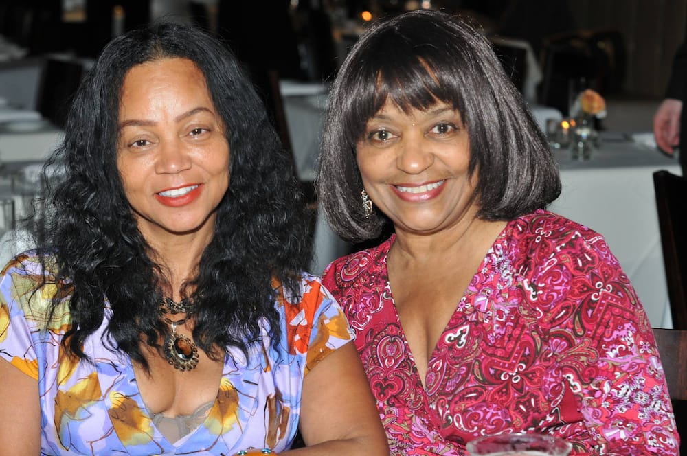 Denise Gordy in a smiley face and Patrice Gordy