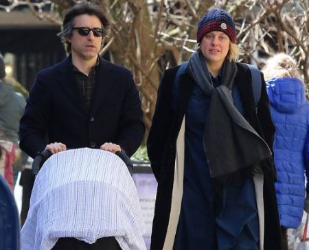 Noah Baumbach and his partner, Greta Gerwig with their child