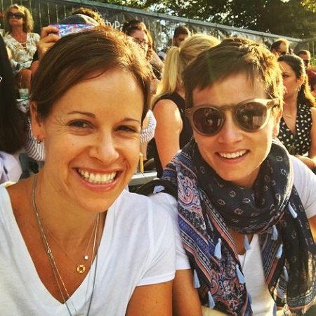 Lesbian partner, Jenna Wolfe and Stephanie Gosk at the Central Park summer season in 2017