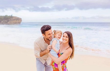 Tanner and wife Jade with their child