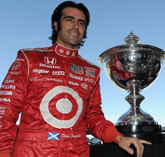 Dario Franchitti holding the IndyCar Championship Trophy
