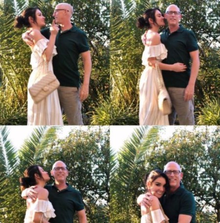 Kristina Basham and Scott Adams showing love for each other.