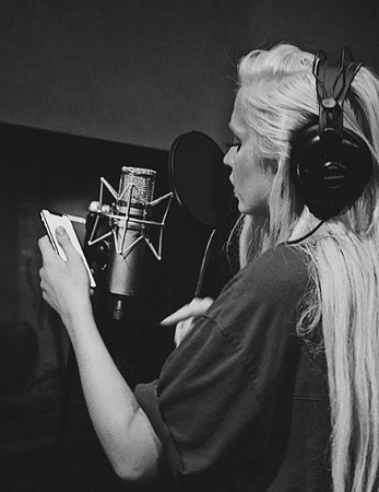 Image: Macy recording her songs. Instagram @macykatemusic