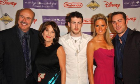 Phil McGraw and Robin McGraw with their two sons and daughter-in-law