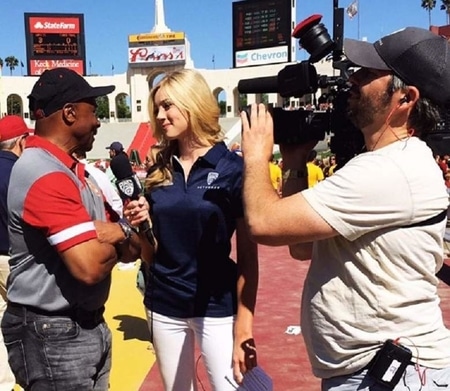 Abby Hornacek interviewing for Fox Sports