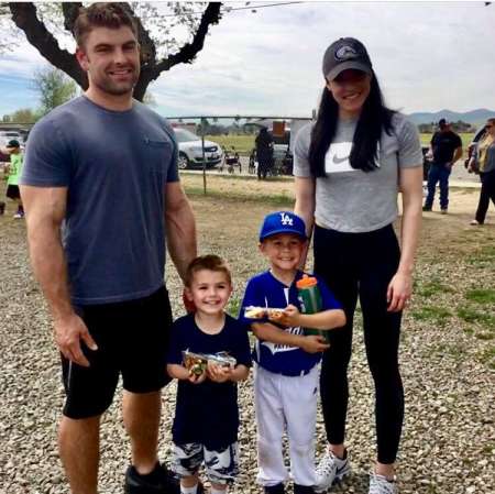 Kaitlyn Plum and her husband, Matthew Lawrence with their children
