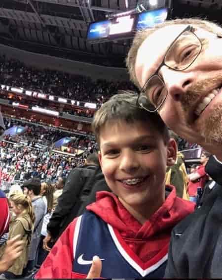Chuck Todd with his son Harrison Todd at the sporting event