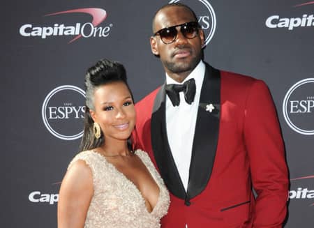 LeBron James with his wife Savannah James at the Capital One cup