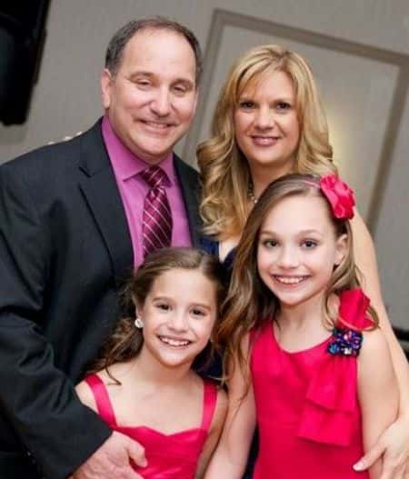 Matthew Gisoni's stepsisters, Maddie and Mackenzie Ziegler with their mother Melissa Gisoni, and stepfather Greg Gisoni. 