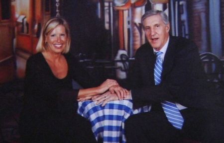 Tammy Jessop holding hands of her husband, Jerry Sloan