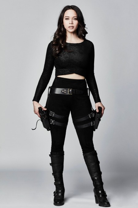 Melissa O'Neil wearing the costume of Portia Lin of Dark Matter