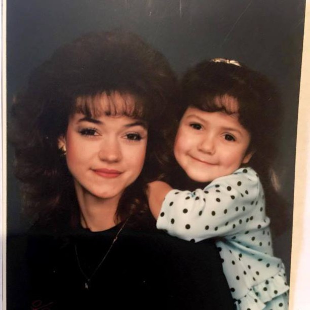 Yolanda with her daughter and together posing for a picture