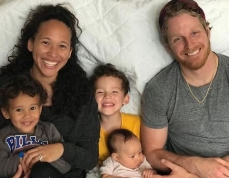 Cole Beasley and Kyrstin Beasley with their three children