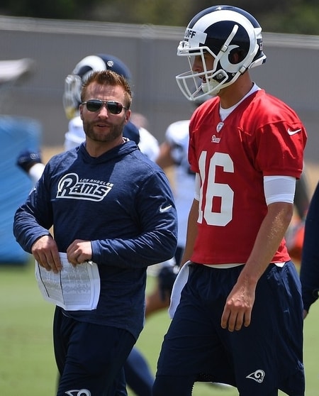 Sean McVay giving instructions to his player at the Rams