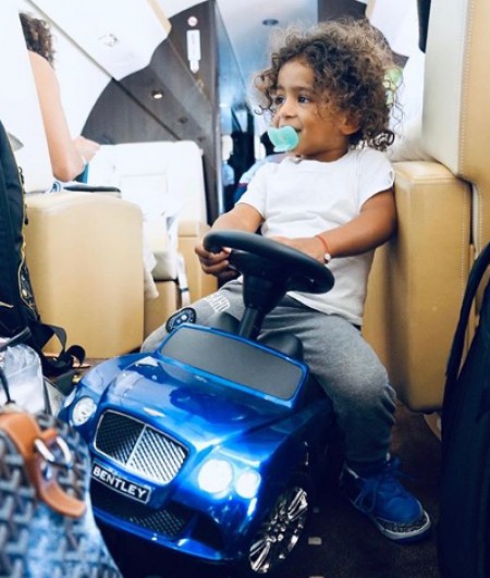 Asahd driving his toy car Bentley on his father's private jet. Know about his net worth, earnings, income, salary, total assets, properties