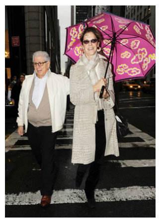 Carl and Christine walking on the sidewalk in NYC