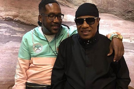 Keita Morris with his father, Stevie Wonder