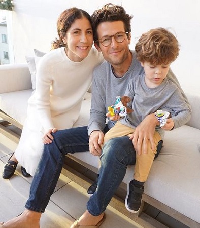 Image: Jacob with his wife, Nicole Cari and son
