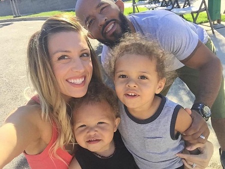 Destiny Bartels with her two daughters and a husband